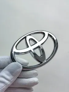 Значок Тойота на багажник 80/54 ,эмблема Toyota на багажник 1 шт.