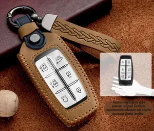 Защитный чехол MyPads M-232949 из натуральной кожи в коричневом/синем цвете с брелком для автомобильного смарт ключа марки Genesis G70, G70 Shooting Brake, GV70, G80, GV80, G90 Дженезис