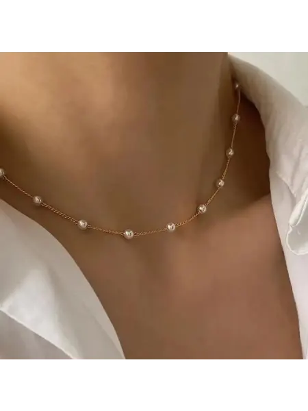 Золотистая цепочка с жемчужинами