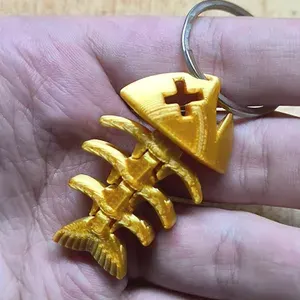 Брелок скелет рыбы для ключей золотистый