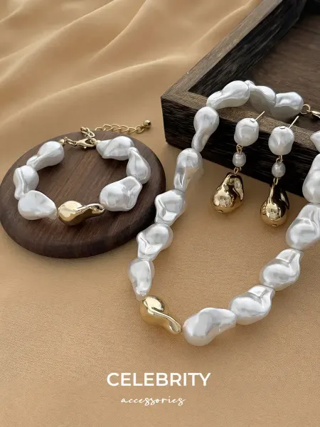 CELEBRITY ACCESSORIES Колье серьги и браслет из жемчуга