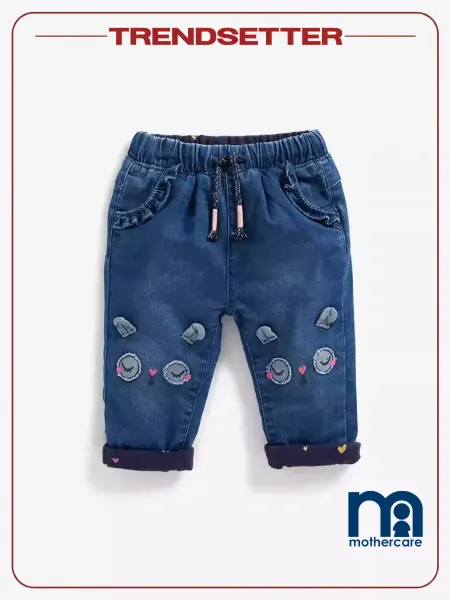 Mothercare Джинсы детские на резинке зауженные с вышивкой с подворотами