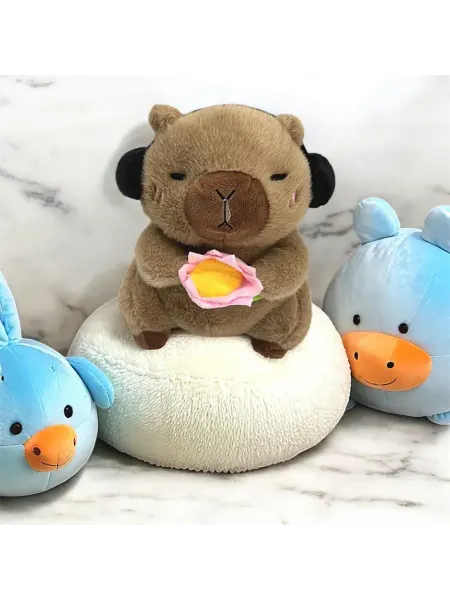 Nina Мягкая игрушка капибара в наушниках и цветочком