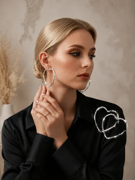 Caroli Серьги сердечки серебристые бижутерия