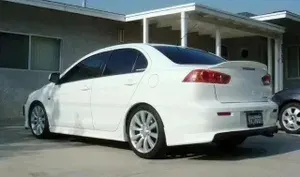 Спойлер Mitsubishi Lancer X дактейл под окрас (+ скотч) / Митсубиси Лансер 10