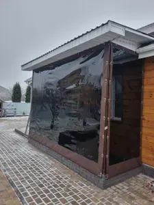 Мягкое тонированное окно с креплением на пластиковой поворотной скобе (Коричневая окантовка) 120х115